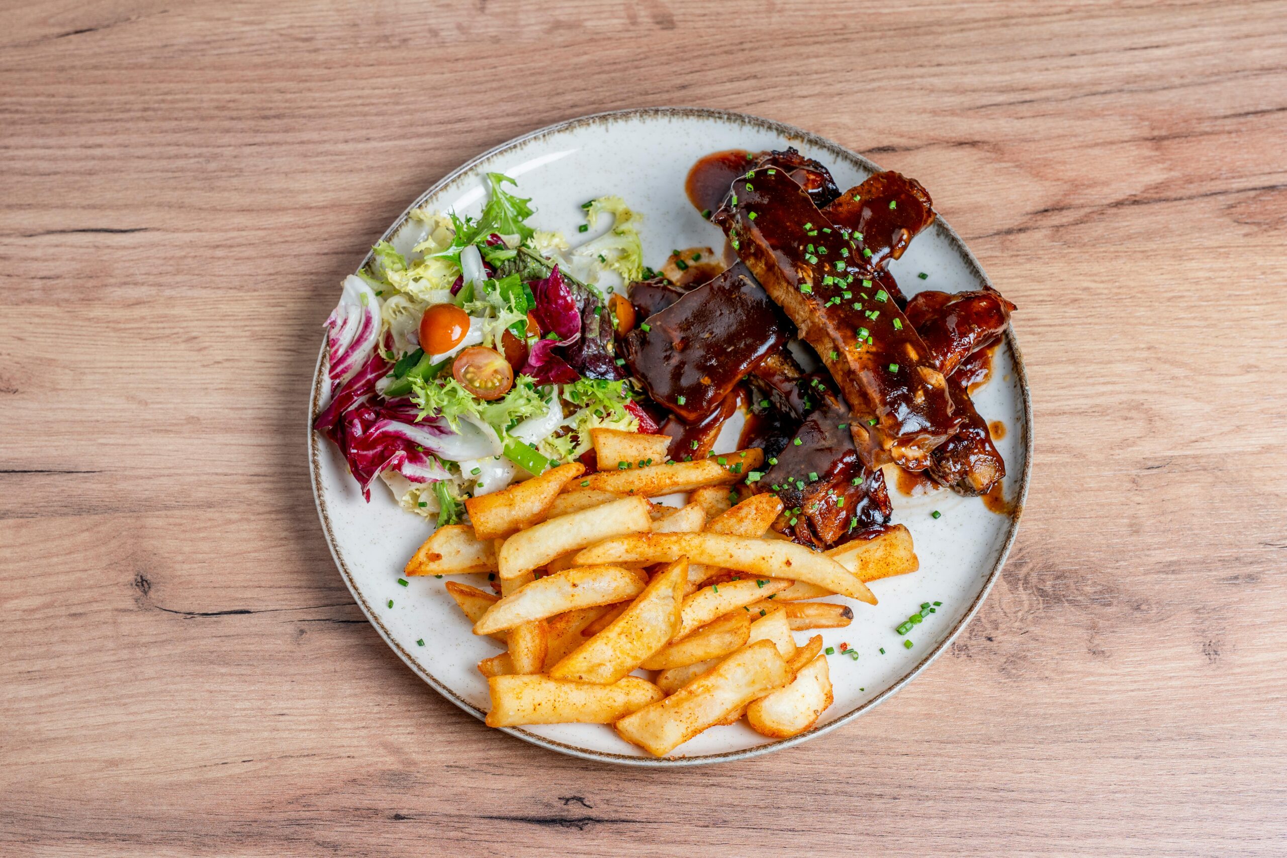 Instant Pot BBQ pork spareribs with fries and salad
